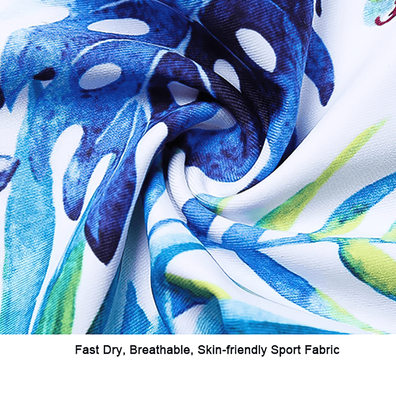 Close-up of vibrant blue and green floral print on breathable, skin-friendly sports fabric for high-waist leggings.